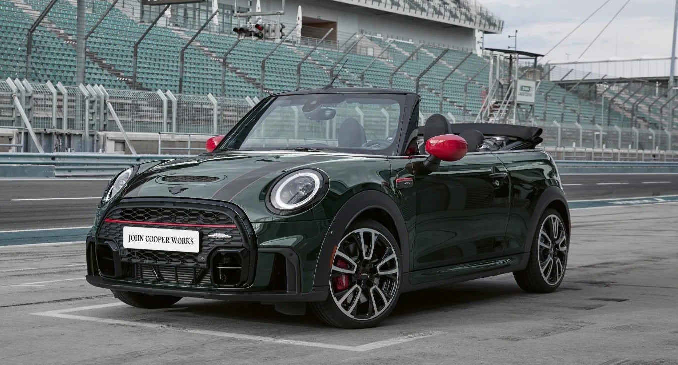 The JCW MINI Convertible zooming on the racetrack. | MINI of Madison in Madison WI